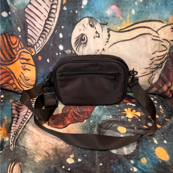 Sleek Black Crossbody Bag with Logo Accent - Picture 3 of 3